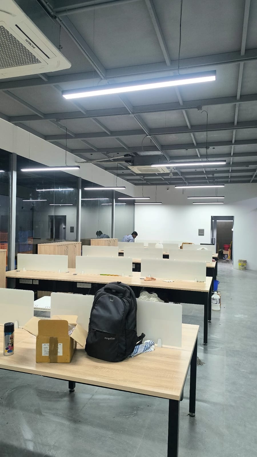 Workstation desks with industrial ceiling